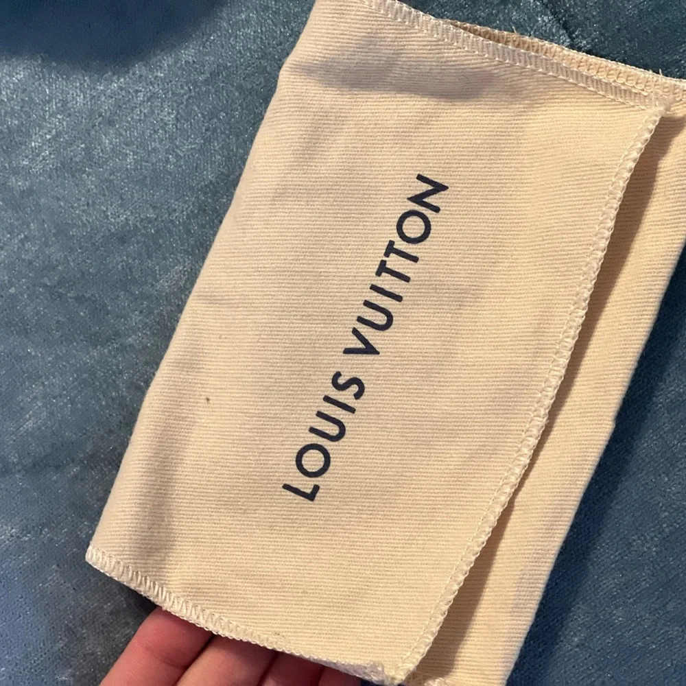 Wallet storage box and dust bag from Louis Vuitton